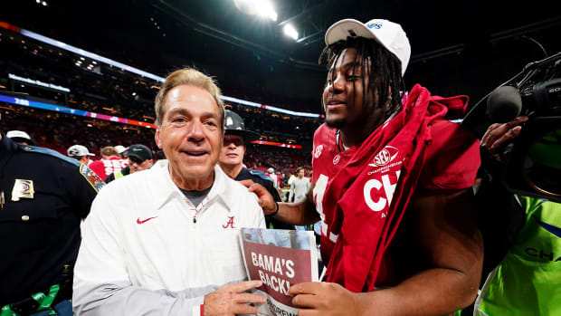 Dec 2, 2023; Atlanta, GA, USA; Alabama Crimson Tide head coach Nick Saban celebrates with defensive lineman James Smith (47) after defeating the Georgia Bulldogs in the SEC Championship at Mercedes-Benz Stadium.